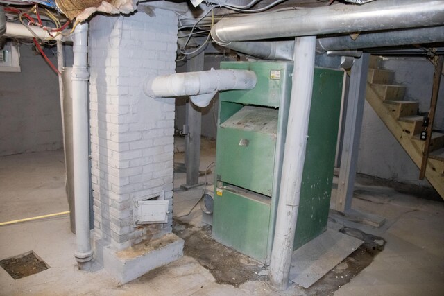2 Watson Ave, Houlton, ME 04730 - utility room featuring heating unit