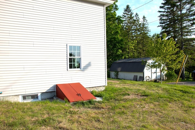 16 Gerry Rd, Sherman, ME 04776 - view of home's exterior with a yard