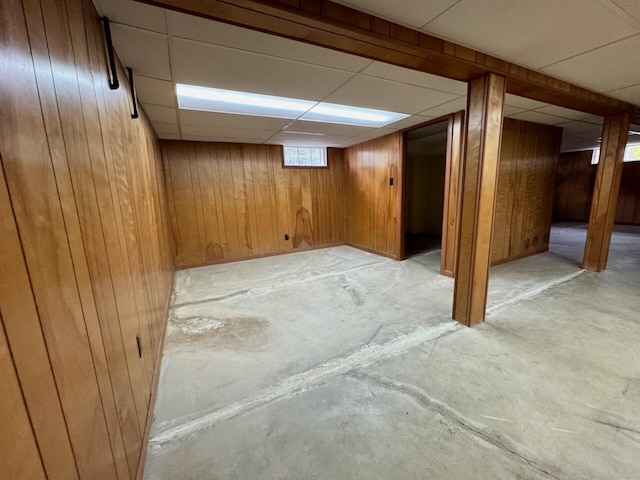 02 Rogers St, Houlton, ME 04730 - below grade area with a paneled ceiling and wooden walls