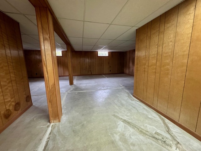 02 Rogers St, Houlton, ME 04730 - basement with a paneled ceiling and wooden walls