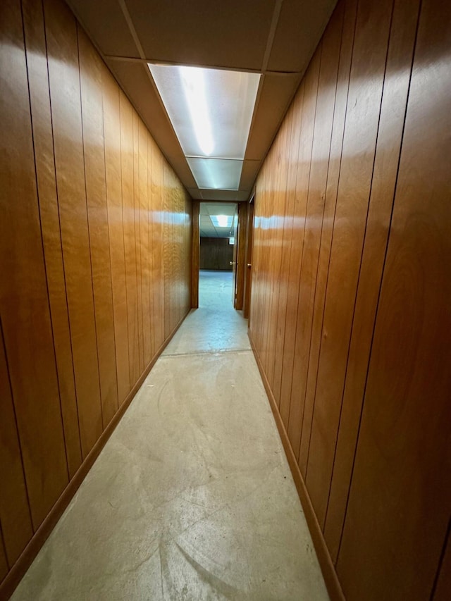 02 Rogers St, Houlton, ME 04730 - hallway with wooden walls and light carpet