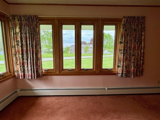 02 Rogers St, Houlton, ME 04730 - carpeted empty room with baseboard heating