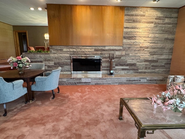 02 Rogers St, Houlton, ME 04730 - carpeted living room featuring recessed lighting and a stone fireplace