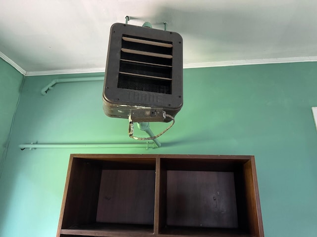 02 Rogers St, Houlton, ME 04730 - detailed view of a heating unit and ornamental molding