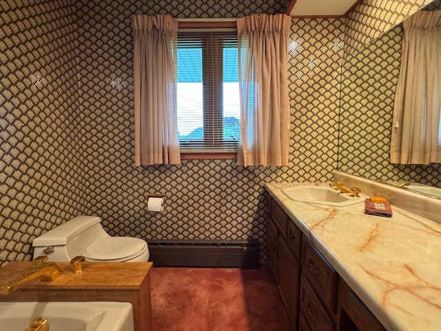 02 Rogers St, Houlton, ME 04730 - bathroom with wallpapered walls, vanity, baseboard heating, and toilet