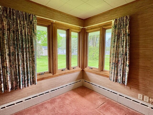 02 Rogers St, Houlton, ME 04730 - unfurnished sunroom featuring a baseboard heating unit