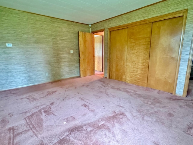 02 Rogers St, Houlton, ME 04730 - unfurnished bedroom featuring a closet and carpet