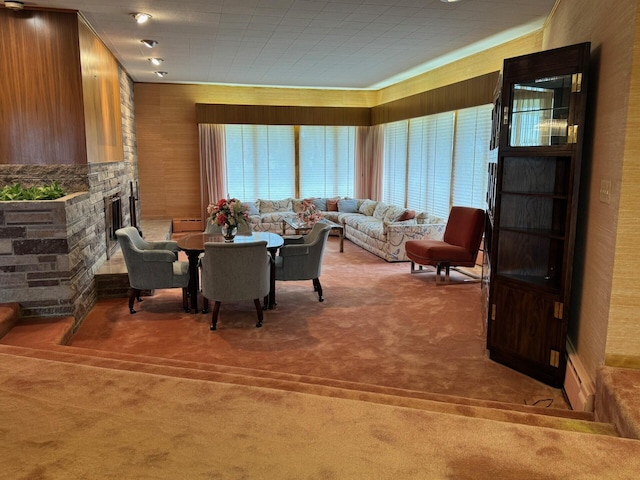 02 Rogers St, Houlton, ME 04730 - carpeted dining area with a fireplace