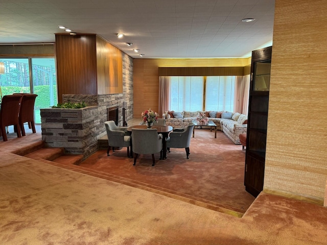02 Rogers St, Houlton, ME 04730 - dining space featuring carpet and wood walls