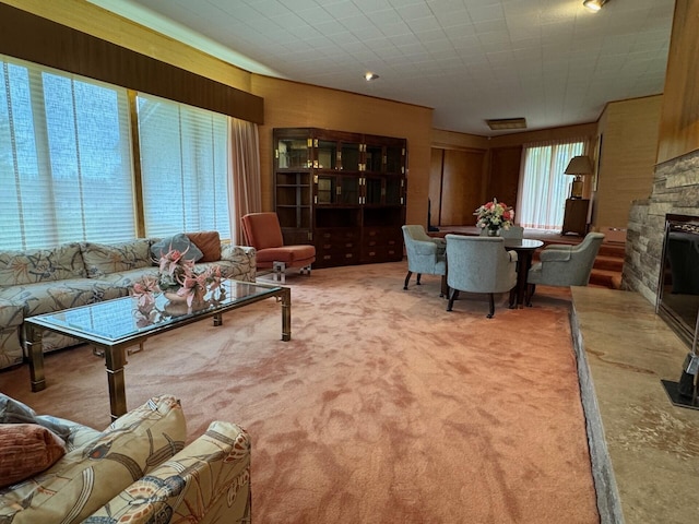 02 Rogers St, Houlton, ME 04730 - living room featuring a stone fireplace and carpet floors