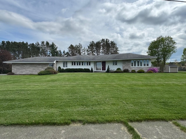 02 Rogers St, Houlton, ME 04730 - single story home featuring stone siding, a front lawn, and a chimney
