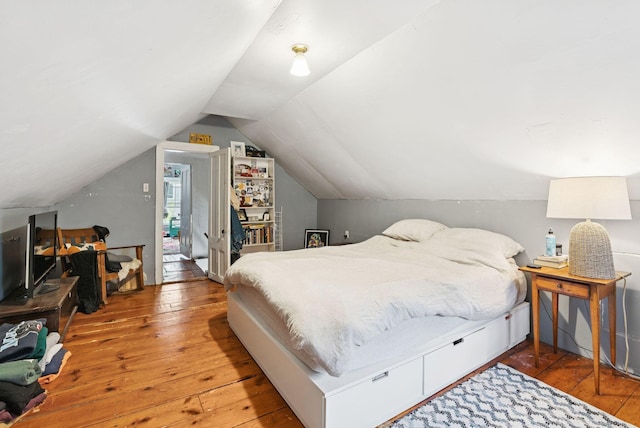 82 Winter St, Portland, ME 04102 - bedroom with hardwood / wood-style floors and lofted ceiling