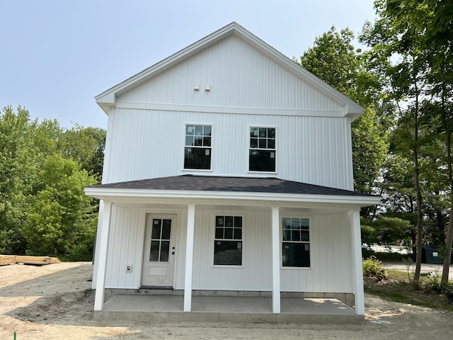 11 Spring St, Lisbon, ME 04250 - view of front facade with covered porch and roof with shingles
