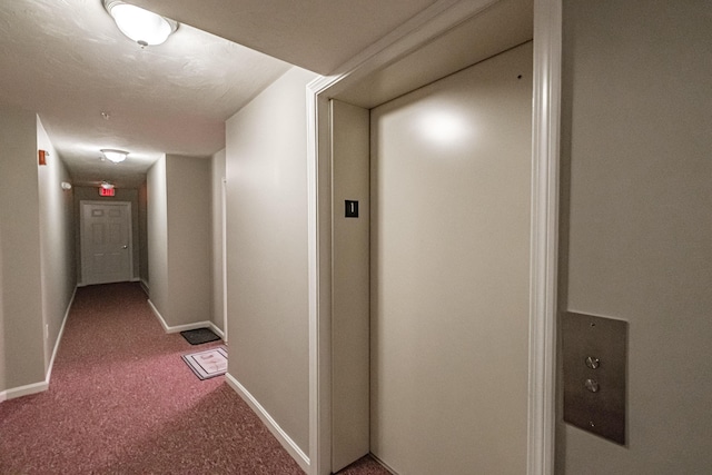 170 E Grand Ave Unit 1, Old Orchard Beach, ME 04064 - hallway with carpet flooring, elevator, and baseboards