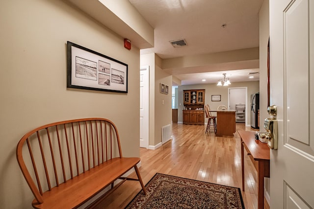 170 E Grand Ave Unit 1, Old Orchard Beach, ME 04064 - hallway featuring light wood-style floors and baseboards