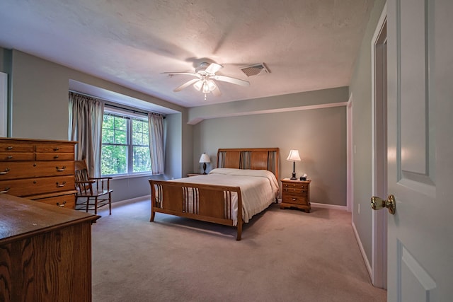 170 E Grand Ave Unit 1, Old Orchard Beach, ME 04064 - bedroom with light carpet, baseboards, and ceiling fan