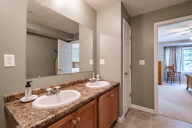 170 E Grand Ave Unit 1, Old Orchard Beach, ME 04064 - full bathroom featuring double vanity, baseboards, and tile patterned floors