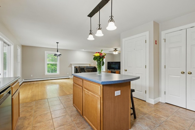 8 Rileys Run, Berwick, ME 03901 - kitchen with baseboard heating, dishwasher, a kitchen island, a ceiling fan, and open floor plan