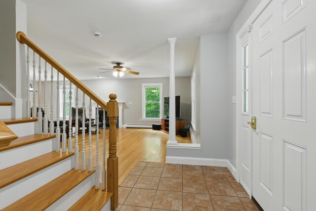 8 Rileys Run, Berwick, ME 03901 - foyer featuring stairs, ceiling fan, baseboards, and a baseboard radiator
