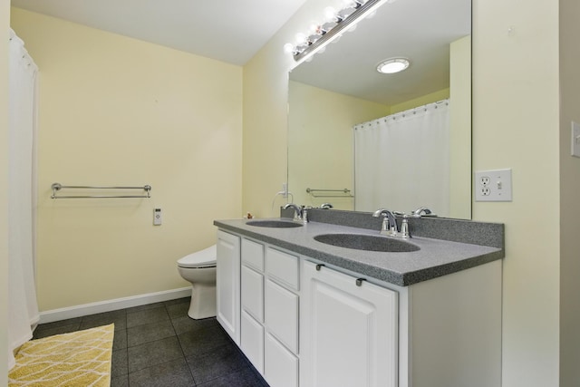 8 Rileys Run, Berwick, ME 03901 - full bathroom featuring double vanity, toilet, tile patterned floors, and baseboards