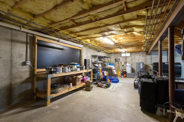 8 Rileys Run, Berwick, ME 03901 - unfinished basement featuring a workshop area and water heater