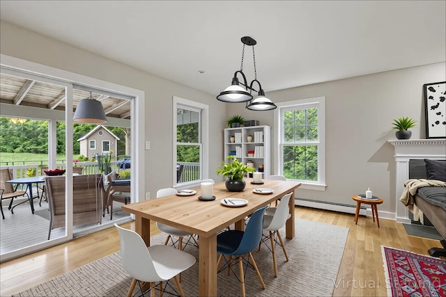 8 Rileys Run, Berwick, ME 03901 - dining space with a baseboard heating unit, plenty of natural light, and light wood finished floors
