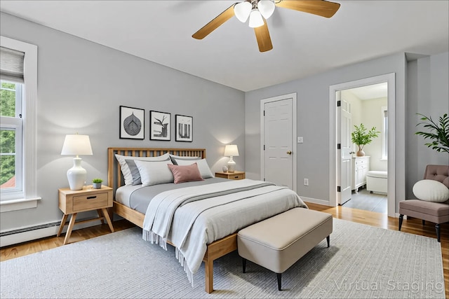 8 Rileys Run, Berwick, ME 03901 - bedroom with wood finished floors, ensuite bathroom, baseboards, and a ceiling fan