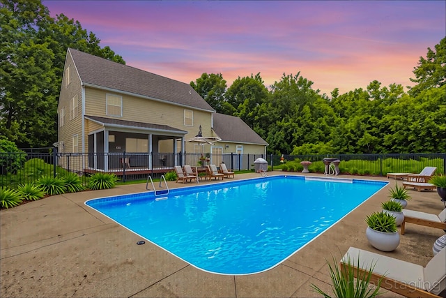 8 Rileys Run, Berwick, ME 03901 - pool at dusk with a patio area and a sunroom