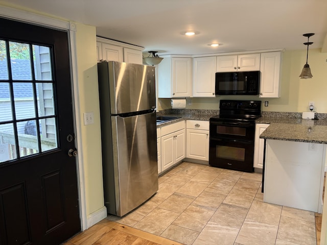 152 Bradman St, Auburn, ME 04210 - kitchen with black appliances, white cabinets, a peninsula, and pendant lighting