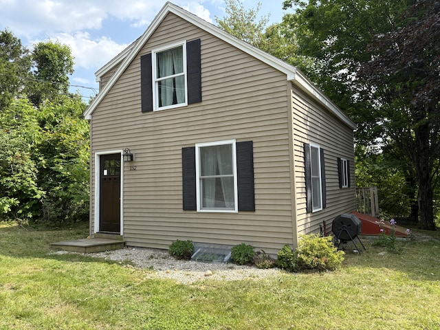 152 Bradman St, Auburn, ME 04210 - back of house with a yard