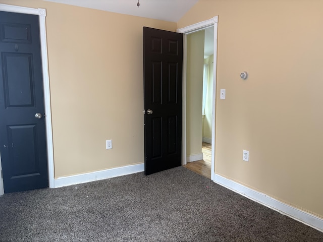 152 Bradman St, Auburn, ME 04210 - unfurnished bedroom with carpet flooring and vaulted ceiling