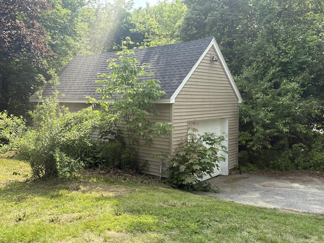 152 Bradman St, Auburn, ME 04210 - view of property exterior with an outdoor structure and a shingled roof