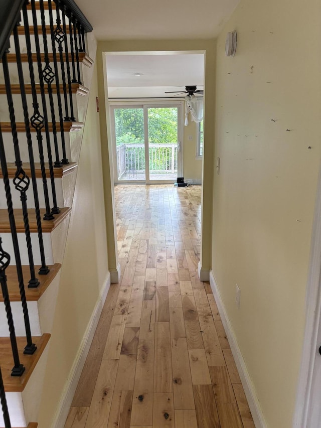152 Bradman St, Auburn, ME 04210 - hallway featuring light wood-style floors and stairway