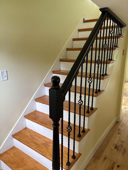 152 Bradman St, Auburn, ME 04210 - stairway featuring hardwood / wood-style flooring and baseboards