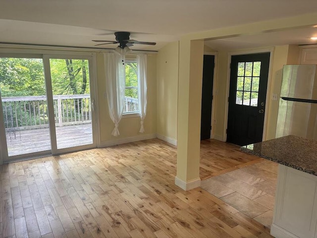 152 Bradman St, Auburn, ME 04210 - unfurnished dining area with ceiling fan and light wood-style floors