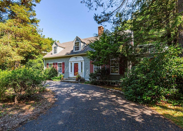 2 Lookout Point Rd, Bar Harbor, ME 04609 - cape cod-style house with a chimney, asphalt driveway, and a shingled roof