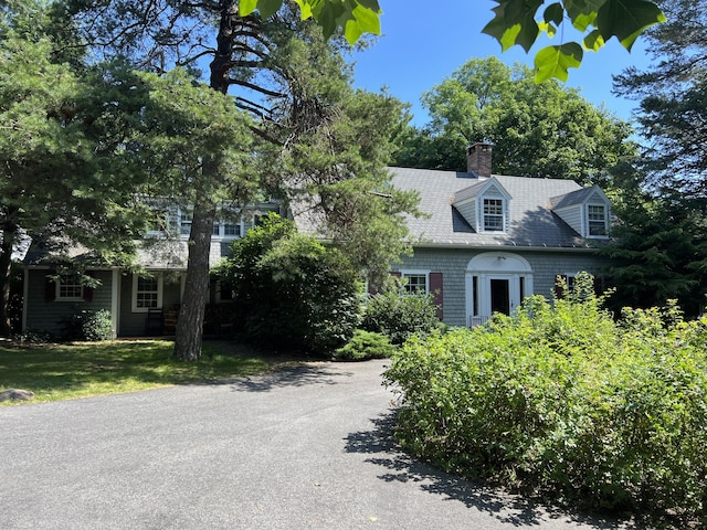 2 Lookout Point Rd, Bar Harbor, ME 04609 - view of front facade featuring a chimney and a front yard