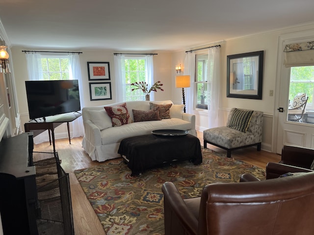 2 Lookout Point Rd, Bar Harbor, ME 04609 - living area with wood finished floors, healthy amount of natural light, and ornamental molding