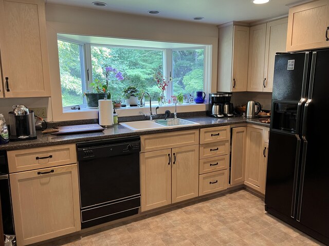 2 Lookout Point Rd, Bar Harbor, ME 04609 - kitchen with black appliances, healthy amount of natural light, light brown cabinets, light flooring, and recessed lighting