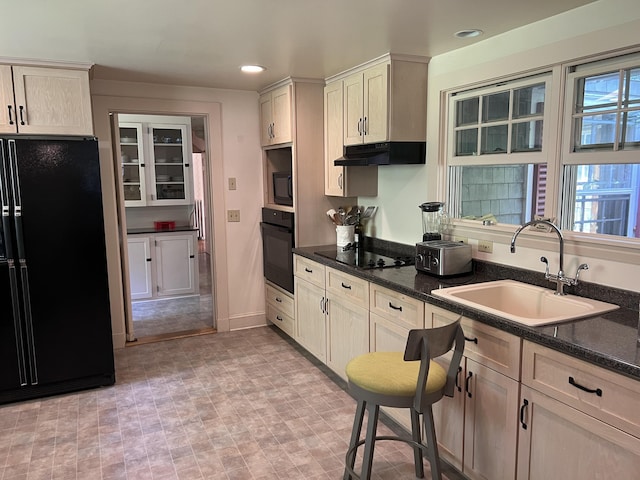 2 Lookout Point Rd, Bar Harbor, ME 04609 - kitchen featuring black appliances, under cabinet range hood, recessed lighting, and dark stone counters