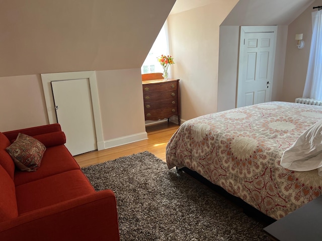 2 Lookout Point Rd, Bar Harbor, ME 04609 - bedroom featuring light wood-style flooring and vaulted ceiling