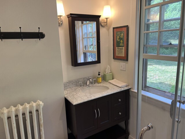 2 Lookout Point Rd, Bar Harbor, ME 04609 - bathroom with radiator heating unit and vanity