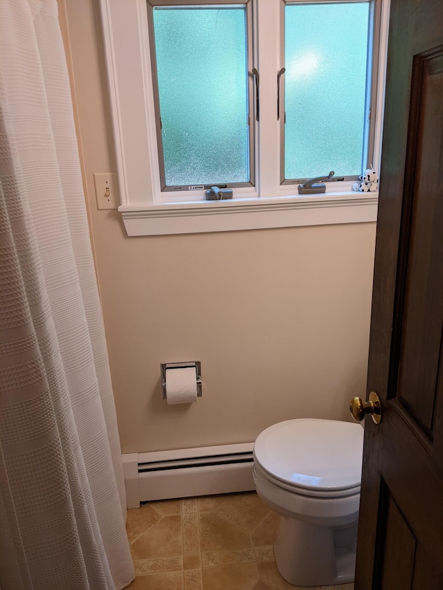630 Youngs Ridge Rd, Acton, ME 04001 - full bathroom with a baseboard radiator, toilet, tile patterned flooring, and plenty of natural light