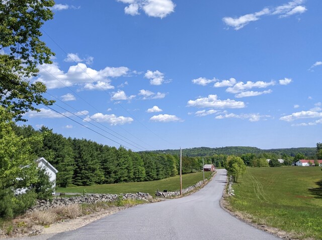 630 Youngs Ridge Rd, Acton, ME 04001 - view of asphalt road with a view of trees