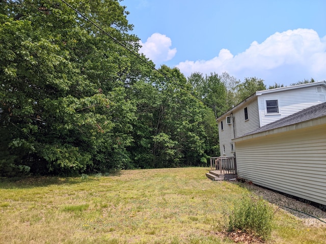 630 Youngs Ridge Rd, Acton, ME 04001 - view of green lawn with a wooden deck