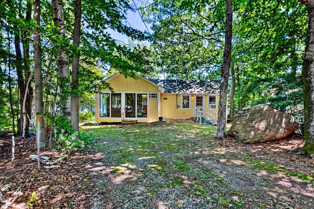 16 Maple Ridge Dr, Monmouth, ME 04259 - back of property featuring a sunroom