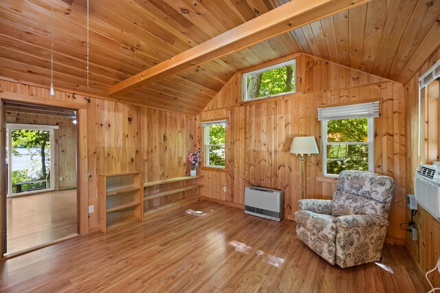 16 Maple Ridge Dr, Monmouth, ME 04259 - living area with wood walls, heating unit, wood finished floors, and wood ceiling