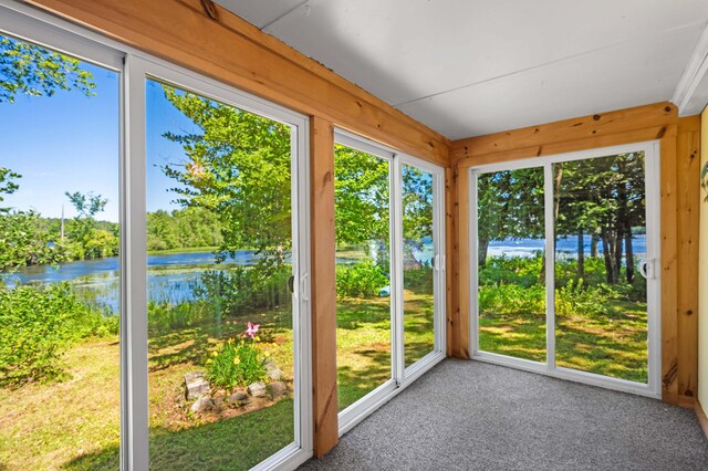 16 Maple Ridge Dr, Monmouth, ME 04259 - unfurnished sunroom with a water view, plenty of natural light, and carpet flooring