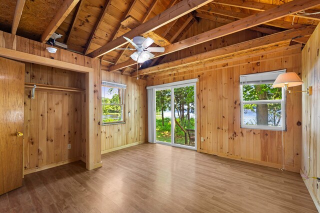 16 Maple Ridge Dr, Monmouth, ME 04259 - unfurnished bedroom with access to outside, wood walls, wood finished floors, baseboards, and wooden ceiling