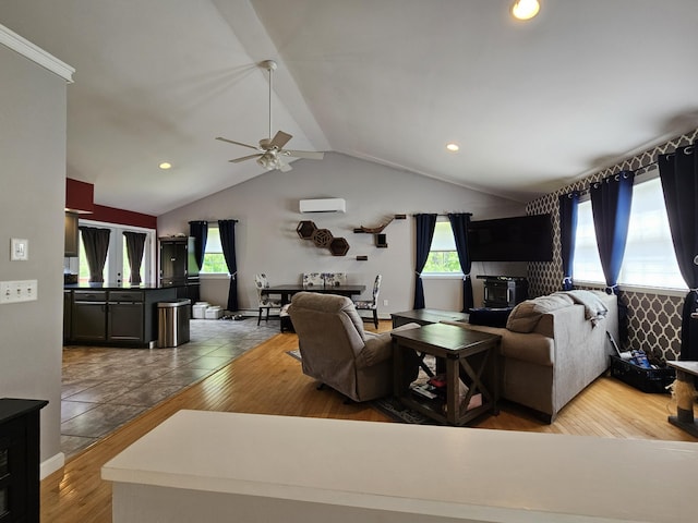 30 Cedar Breeze S, Glenburn, ME 04401 - living room with an AC wall unit, lofted ceiling, a ceiling fan, wood finished floors, and recessed lighting